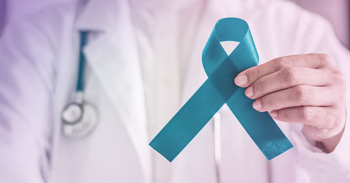 Cervical Cancer Awareness month doctor holding ribbon